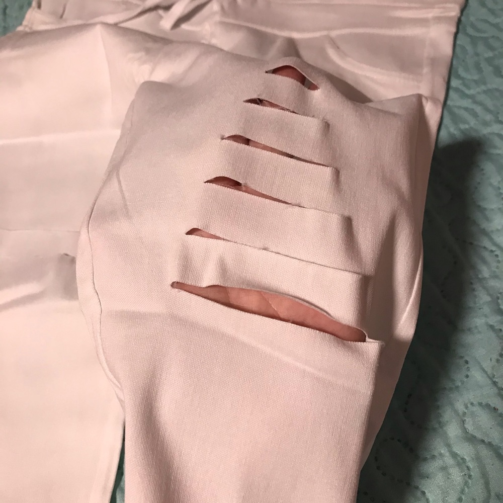 Boutique white ripped ankle pants